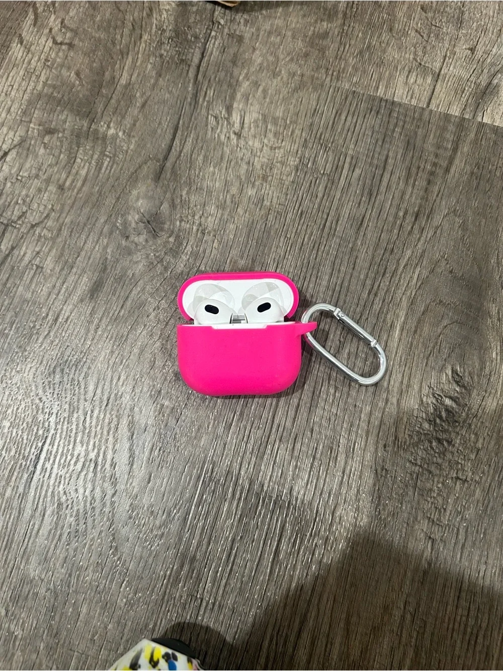 Apple AirPods with Bright Pink Silicone Case and Silver Carabiner